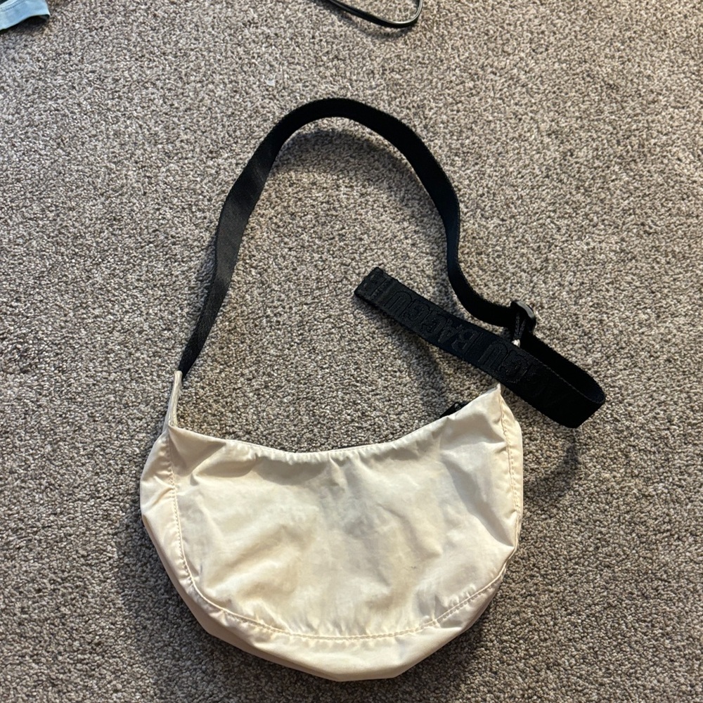 BAGGU Small Crescent Cream Crossbody Bag with Black Strap